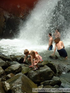 Kids in a waterfall